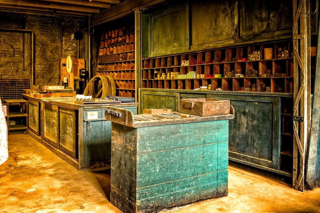 Modern minimalist bedroom with perfectly organized wardrobe and clean surfaces