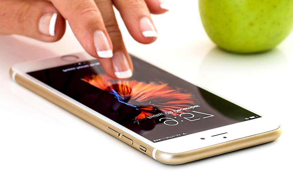 Checklist on mobile device and laptop