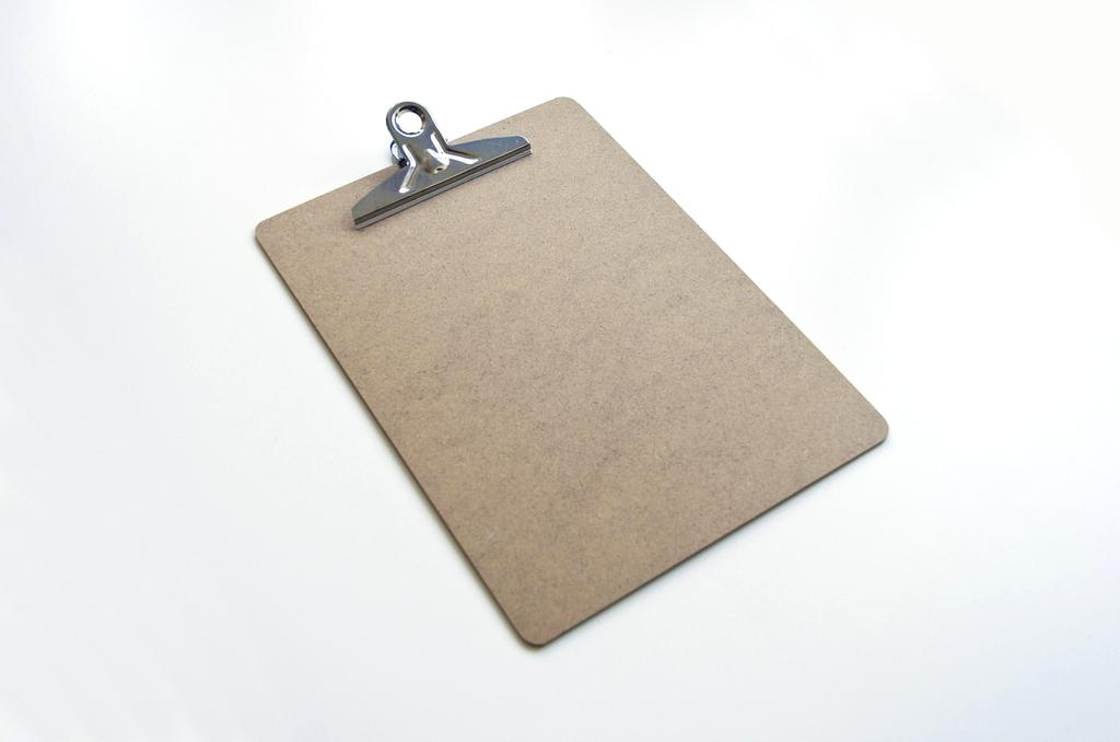 Happy person organizing their room with checklist